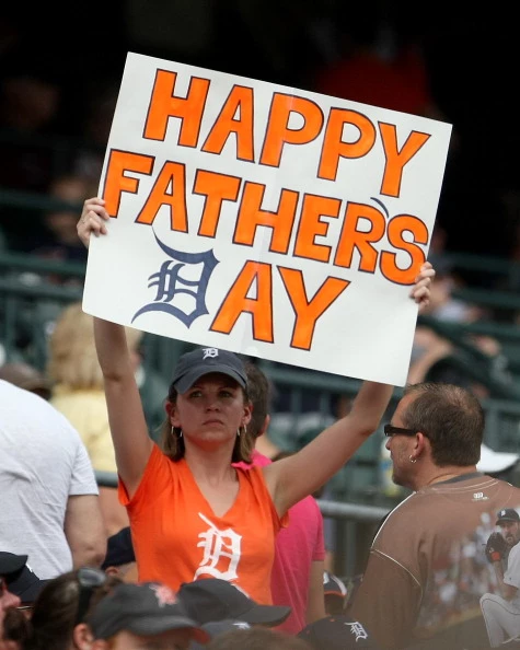 Colorado Rockies v Detroit Tigers A fan holds up a "Father's Day" sign