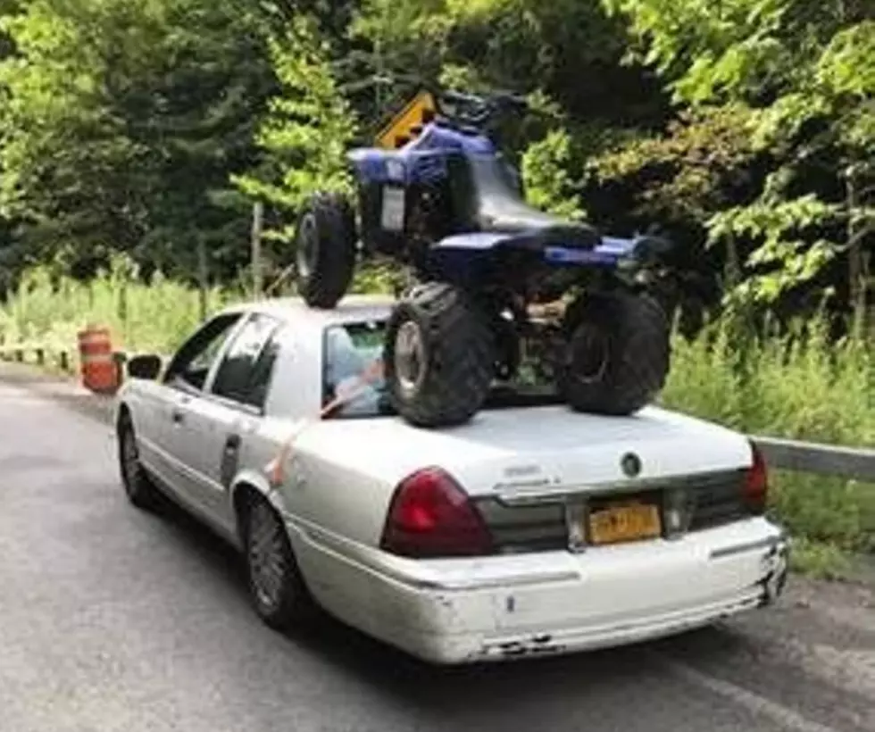 Central NY Man Straps ATV to Roof of Four-Door Sedan
